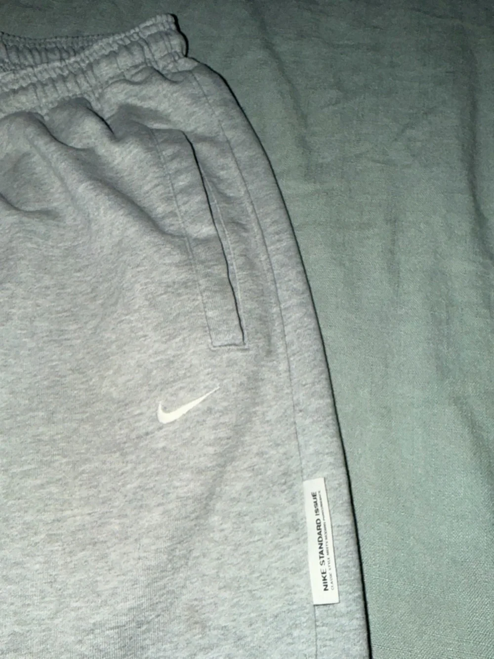 Nike Light Gray Heather Joggers with White Swoosh